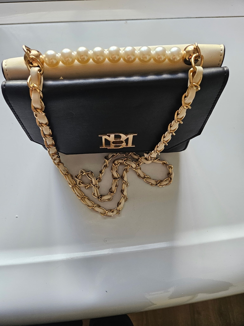 Badgley Mischka Black and Cream Pearl-Handle Crossbody with Gold Chain